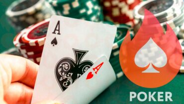 A player's hand holding an ace and king of spades on a poker table with chips, symbolizing the Stealth Tactics of Russian AI Poker Bots.